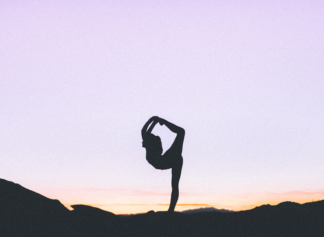 Woman performing a stretching exercise for wellness